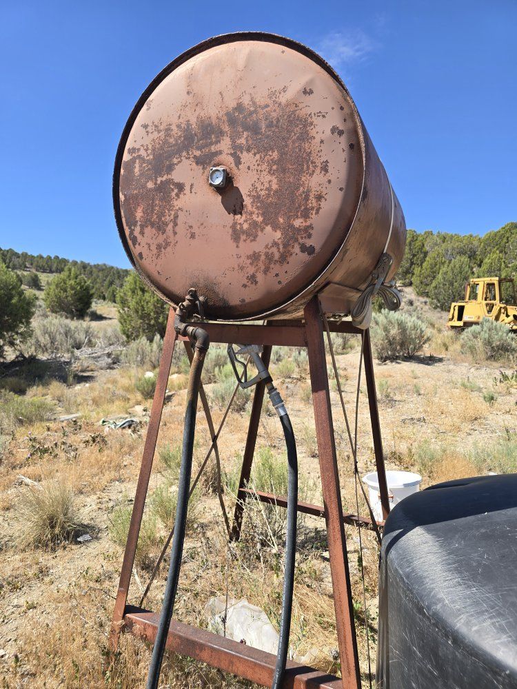 Used Fuel Tank with Stand and Pump - Rusting Metal, Outdoor Storage
