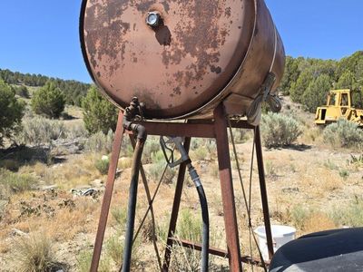 Used Fuel Tank with Stand and Pump - Rusting Metal, Outdoor Storage