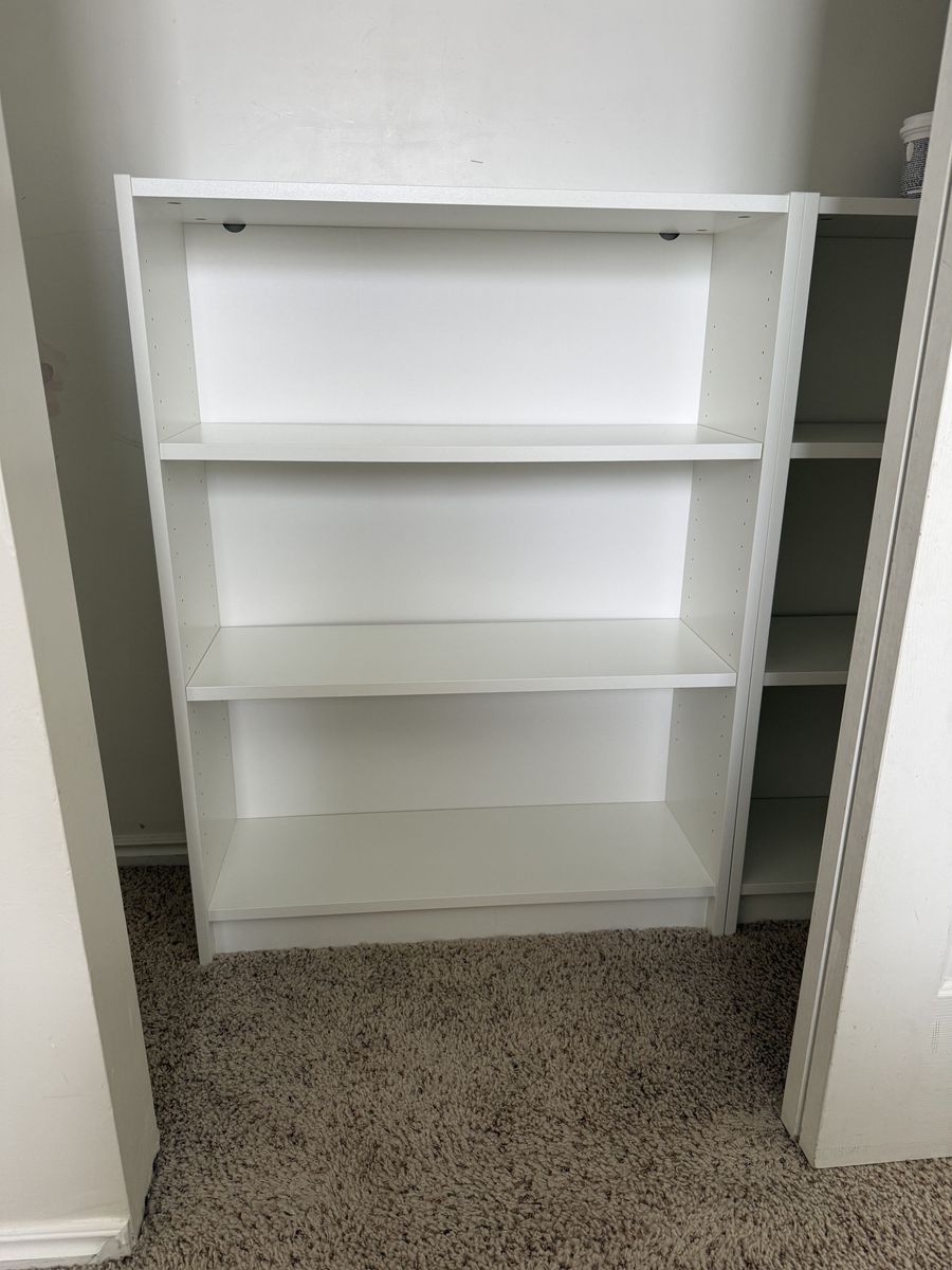 White Ikea bookshelves