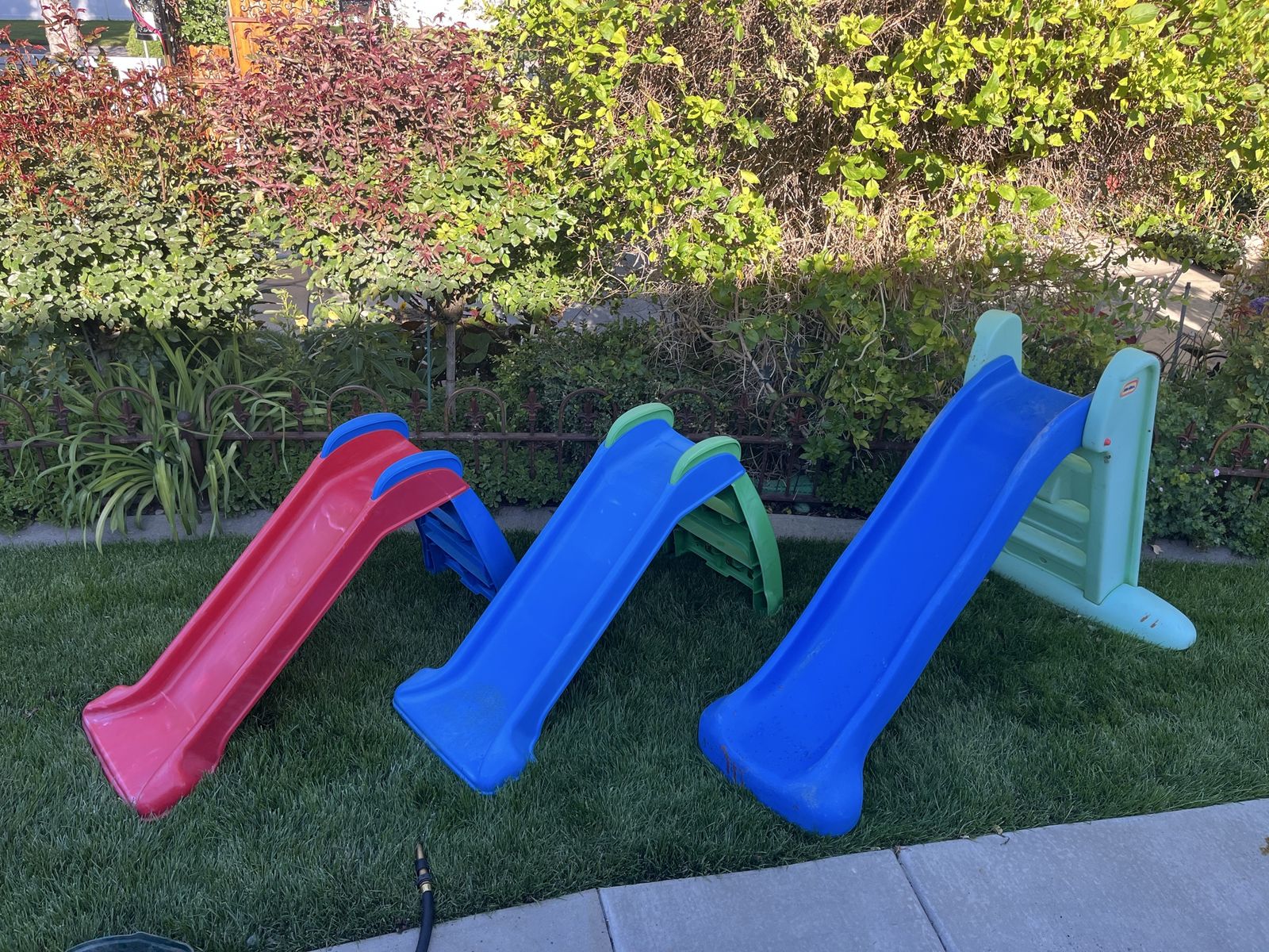 Little tikes slide  shorter $25 each tall thick $85 has some stain on it.