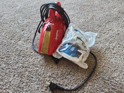 Corded hand vacuum with filters