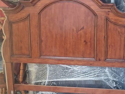 Queen sized mahogany wood bed fram