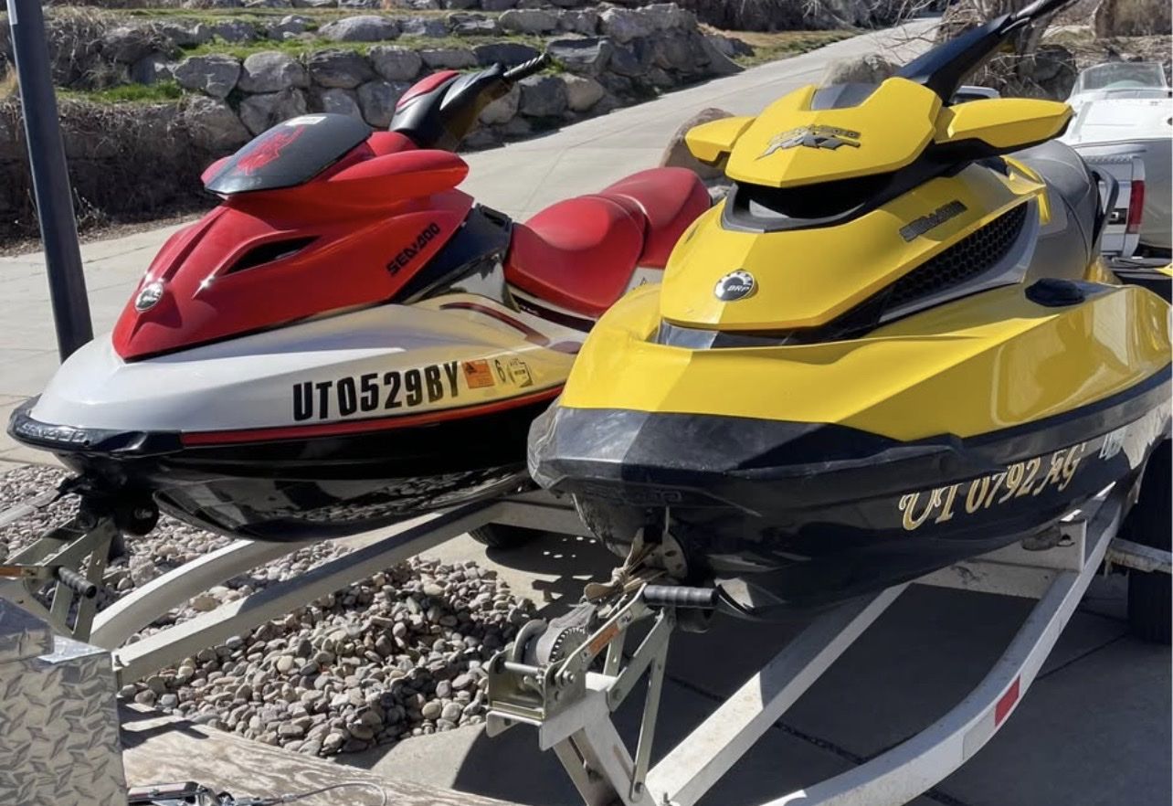 2 Seadoos - 2010 rxt 215 turbo waverunner/jetski-2007 Seadoo wake 155 with trailer