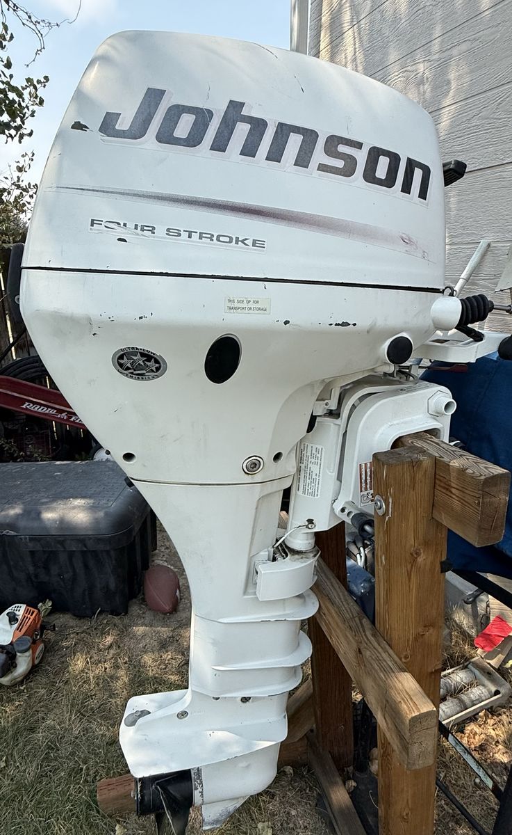 Johnson 9.9 HP Four Stroke Outboard Boat Motor