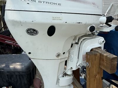 Johnson 9.9 HP Four Stroke Outboard Boat Motor