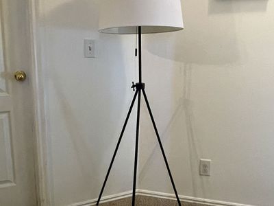 Threshold tripod floor lamp