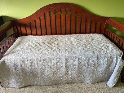 Wooden day bed with pop-up trundle bed and two mattresses