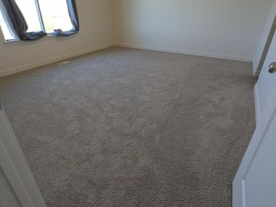 BRAND NEW CARPET needing a home ASAP (so I can have my garage back)