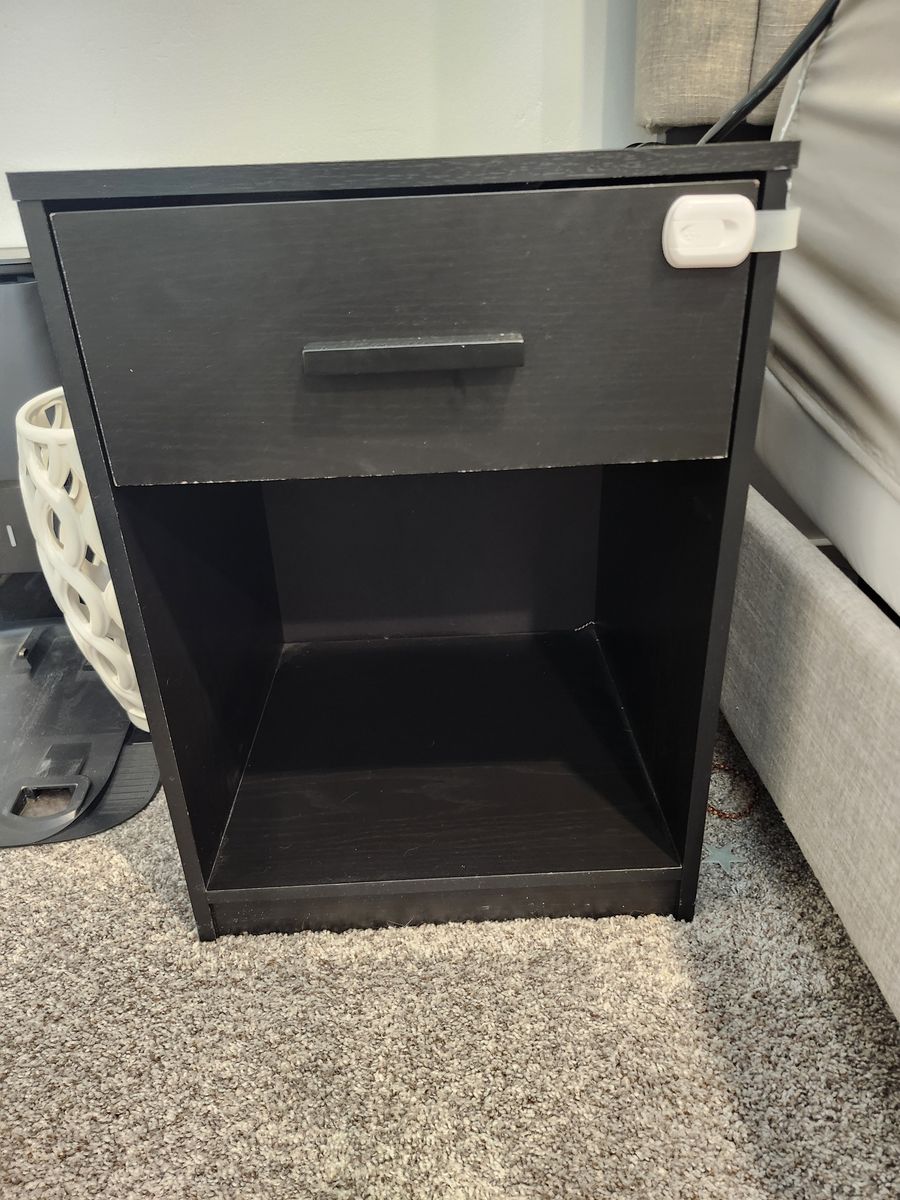 Two black bedside tables