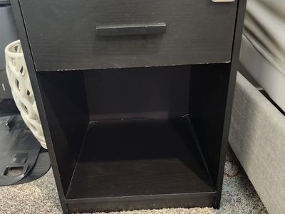 Two black bedside tables