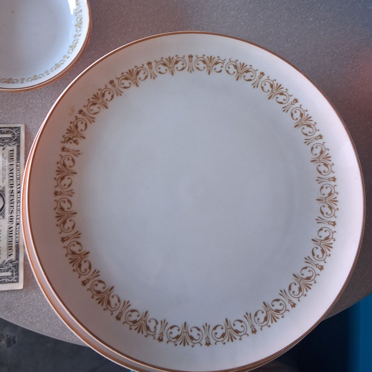 Shuffled dinner plates. Ventage.  1960s