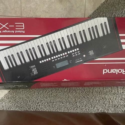 Brand new Roland E-X10 Arranger Keyboard/ piano with Music Rest and Power Adapter.