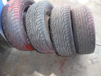 4 Tires and Wheels off a 1965 Mustang 4 lug
