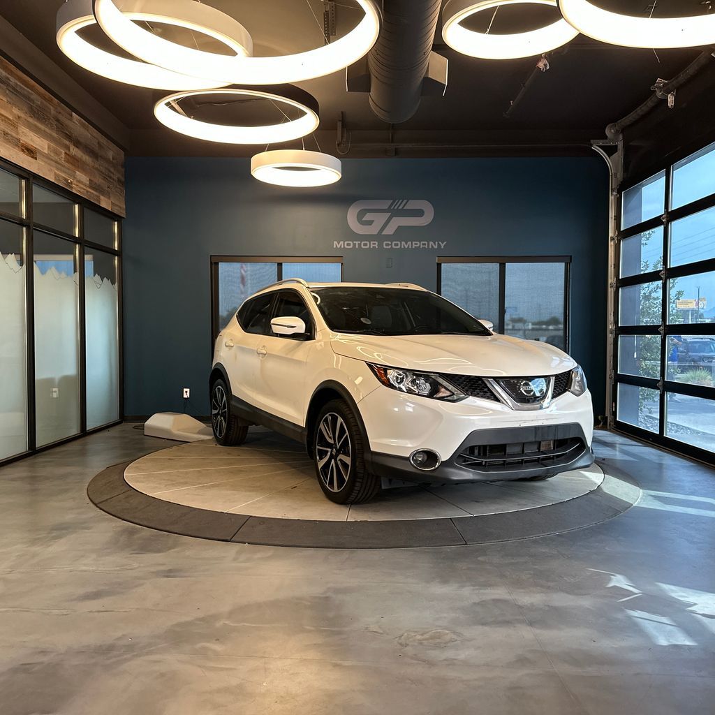 2018 Nissan Rogue Sport SL — rebuilt & branded title, 2% below market