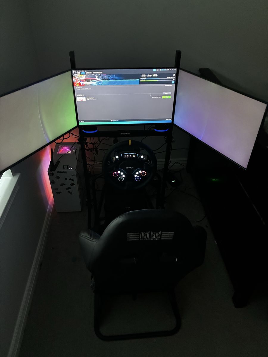 Next Level Racing gt 2.0 racing driving sim simulator Moza Logitech with pc triple monitor