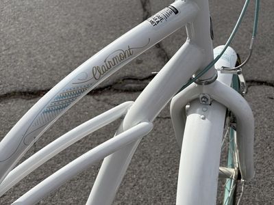 Schwinn Clairmont 7-Speed Cruiser Bike - White/Teal, Shimano Derailleur, Rear Rack