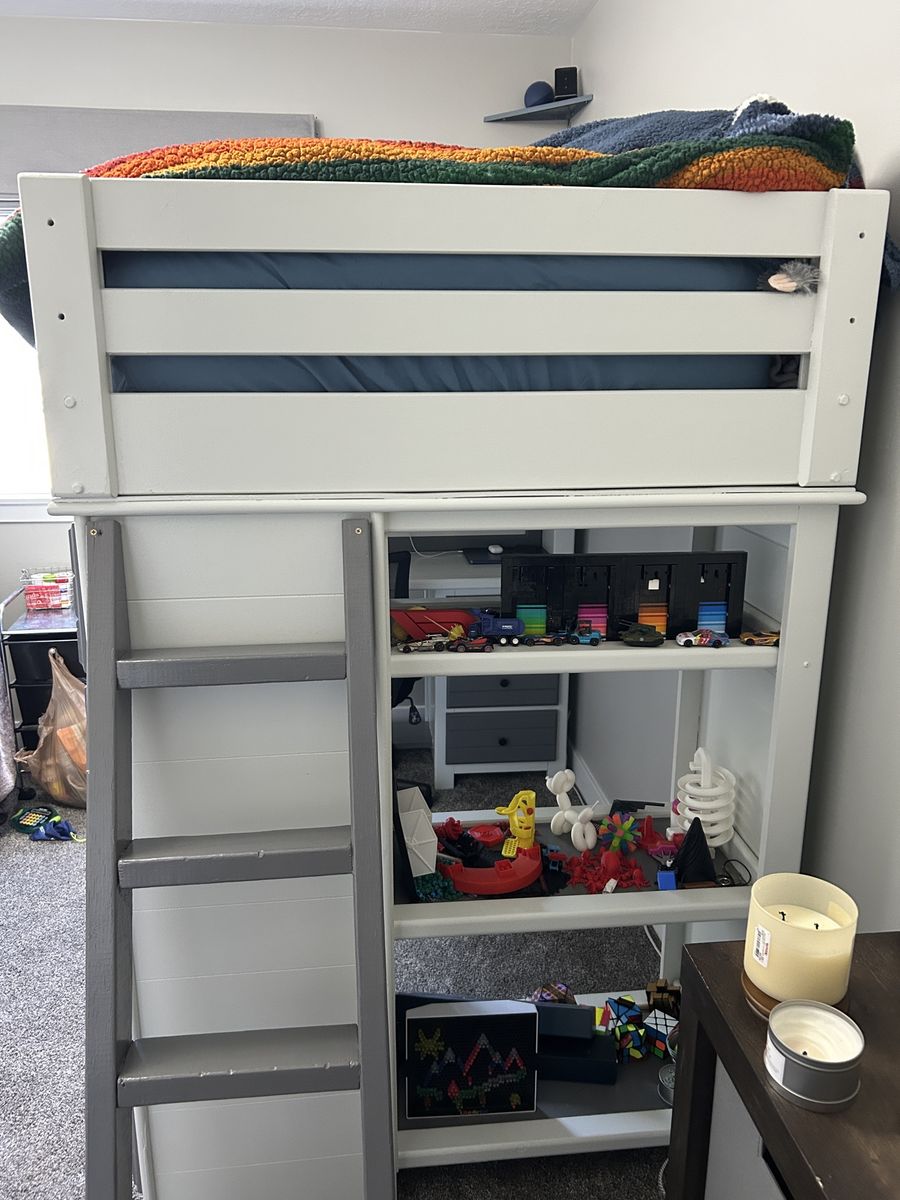 Loft twin bed with desk, shelfs, drawers.