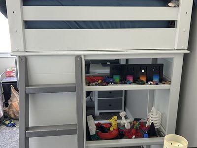 Loft twin bed with desk, shelfs, drawers.