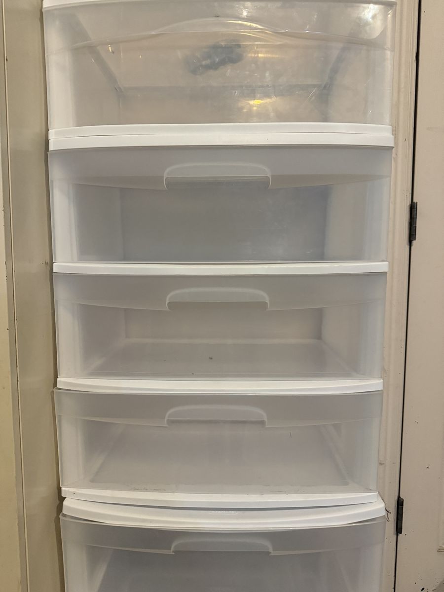 3 sets of clear, wide plastic storage drawers