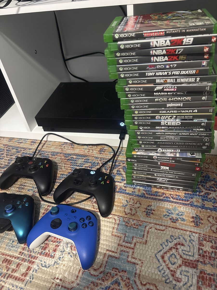 Xbox One X 1TB Console bundle with 4 Controllers & Games
