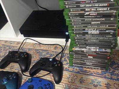 Xbox One X 1TB Console bundle with 4 Controllers & Games