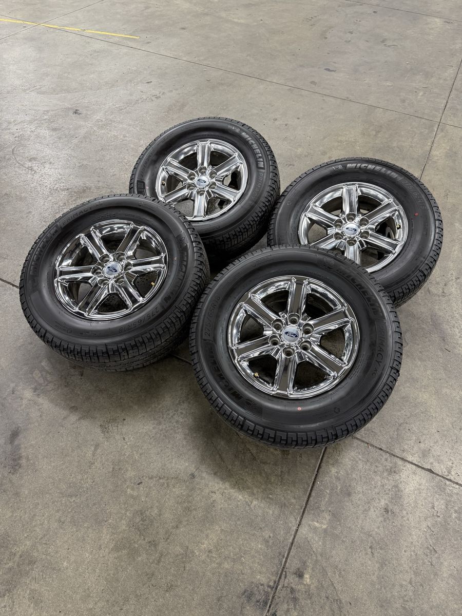 LIKE NEW 2025 f150 OEM 18in chromes/ 275/65/18 Michelins