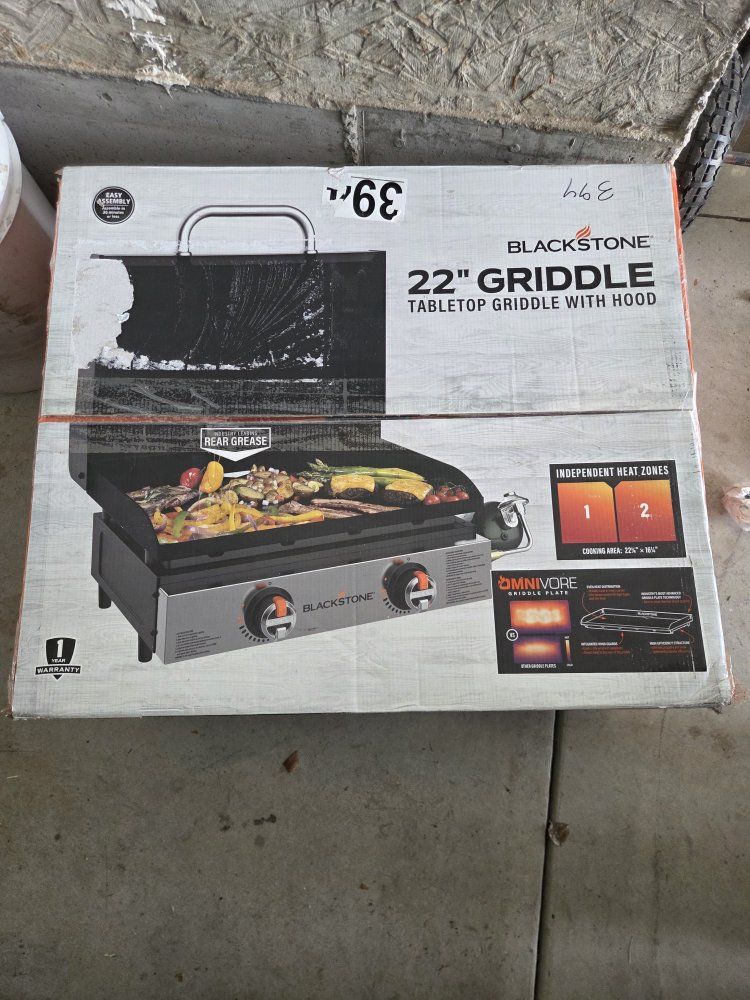 New In Box Blackstone 22 inch griddle with hood.