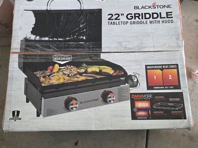 New In Box Blackstone 22 inch griddle with hood.