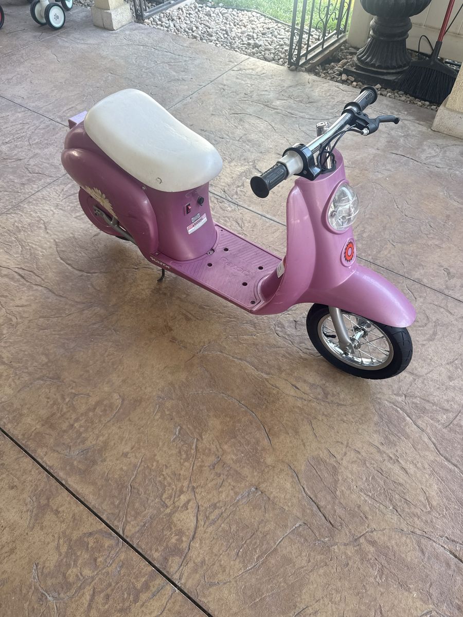 Razor Pocket Mod Electric Scooter - Purple/Pink Daisy Edition New Batteries and charger.
