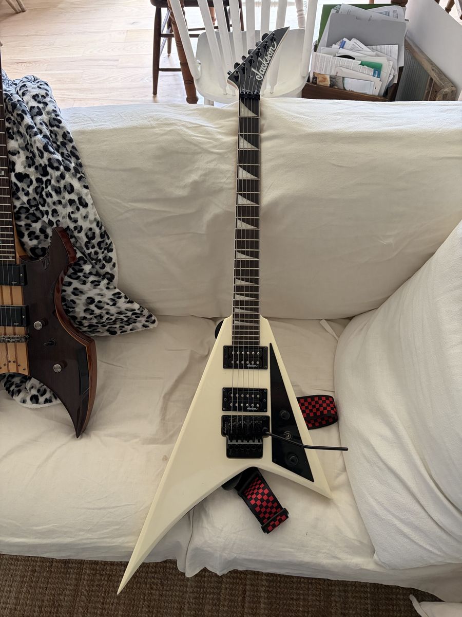 Jackson JS32 Rhoads Flying V Electric Guitar - White, w/ Checkered Strap