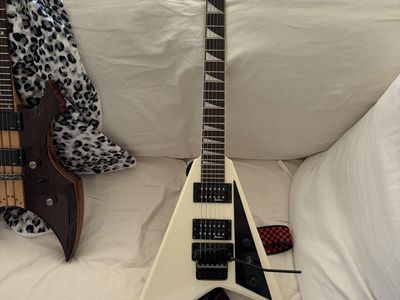 Jackson JS32 Rhoads Flying V Electric Guitar - White, w/ Checkered Strap