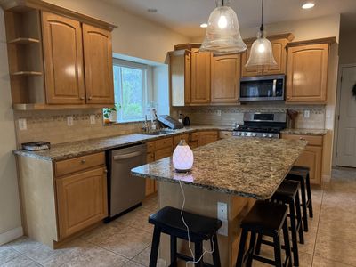 Kitchen Cabinets, Drawers, and Granite Countertops