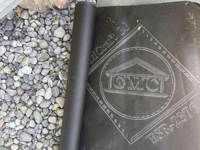 Moisture barrier building paper