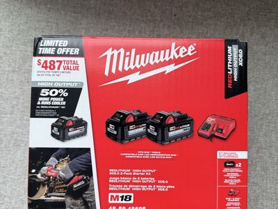 2 Milwaukee XC6.0 High Output Batteries and Charger