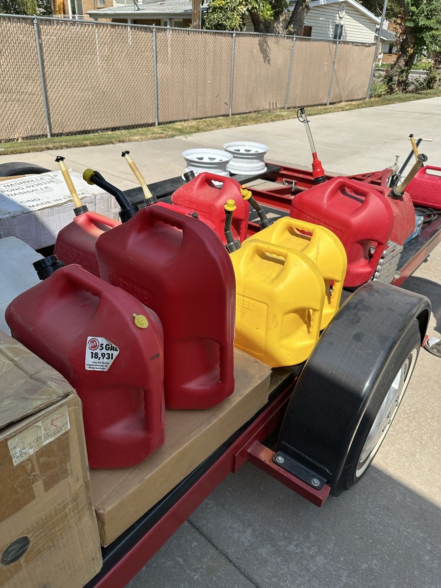 Assorted Gas and Diesel Fuel Cans (5 Gallon Containers). 