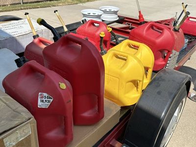 Assorted Gas and Diesel Fuel Cans (5 Gallon Containers).