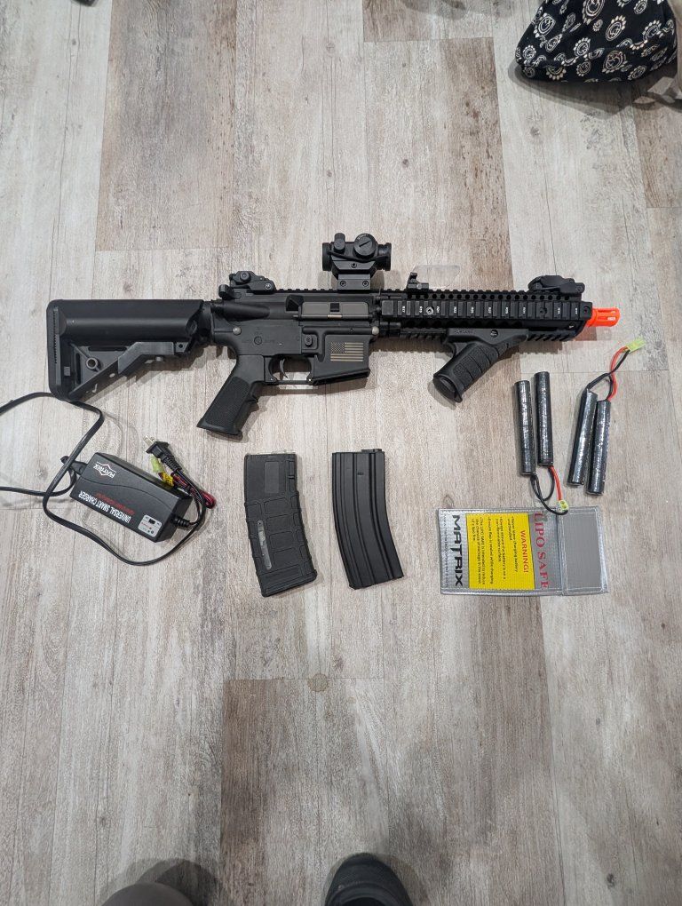 Airsoft M4 Rifle Bundle with Red Dot Sight, Foregrip, Magazines, Batteries, and Charger