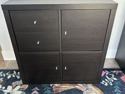 IKEA KALLAX - Black-Brown Cube Storage with cabinets and drawers.