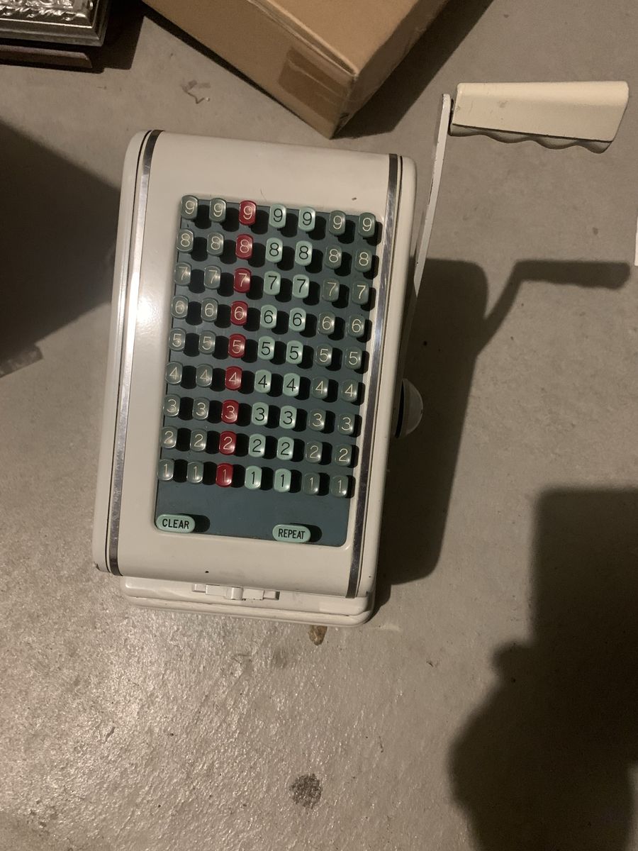 I believe this is a vintage check writing machine.