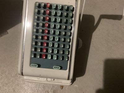 I believe this is a vintage check writing machine.