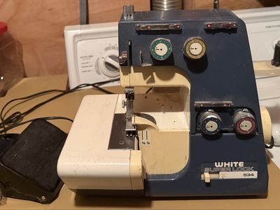 White Super Lock 534 Serger Sewing Machine with Foot Pedal - Used, Good Condition