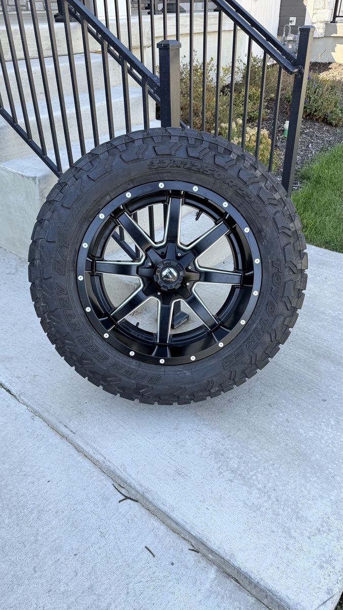 Dodge Ram 3500 Rims and Tires 37/12.50R22 Toyo RT Trail Load F 12ply
