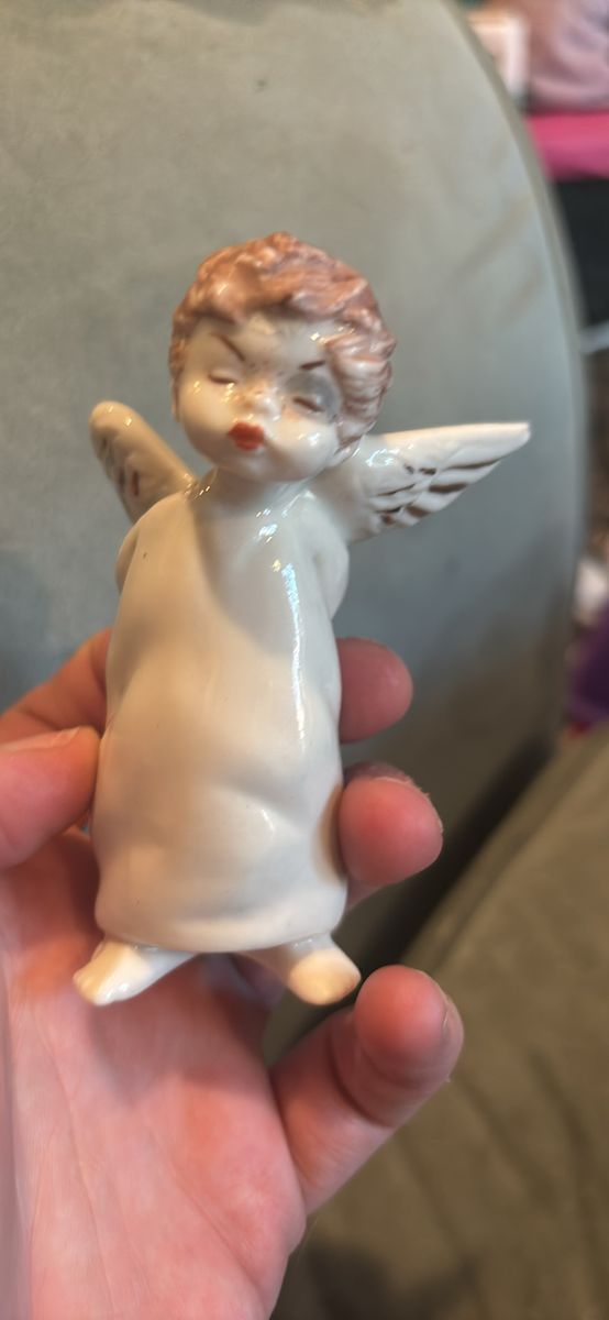 Vintage Ceramic Mischievous Angel Figurine with Slingshot Behind Back