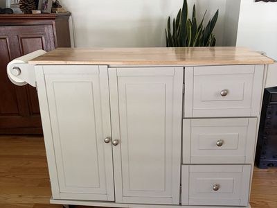 Off white mobile kitchen cart with drop leaf