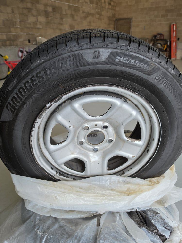 Bridgestone Blizzak 215/65R16 Winter Tires on Steel Rims - Set of 4