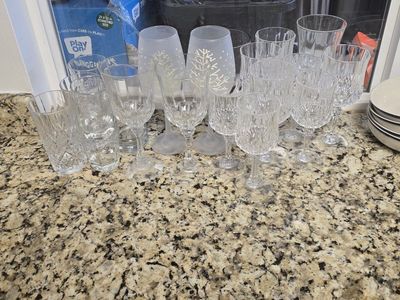 glass wine and water cups and bowls