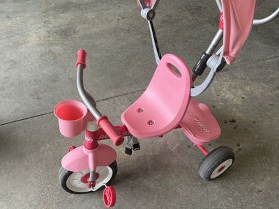 Radio Flyer 4-in-1 Stroll 'N Trike Pink Kids Tricycle with Canopy and Push Handle