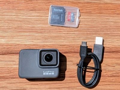 GoPro HERO7 Silver 4K Action Camera Bundle + Floating Grip + Waterproof Housing + 64GB SD Card