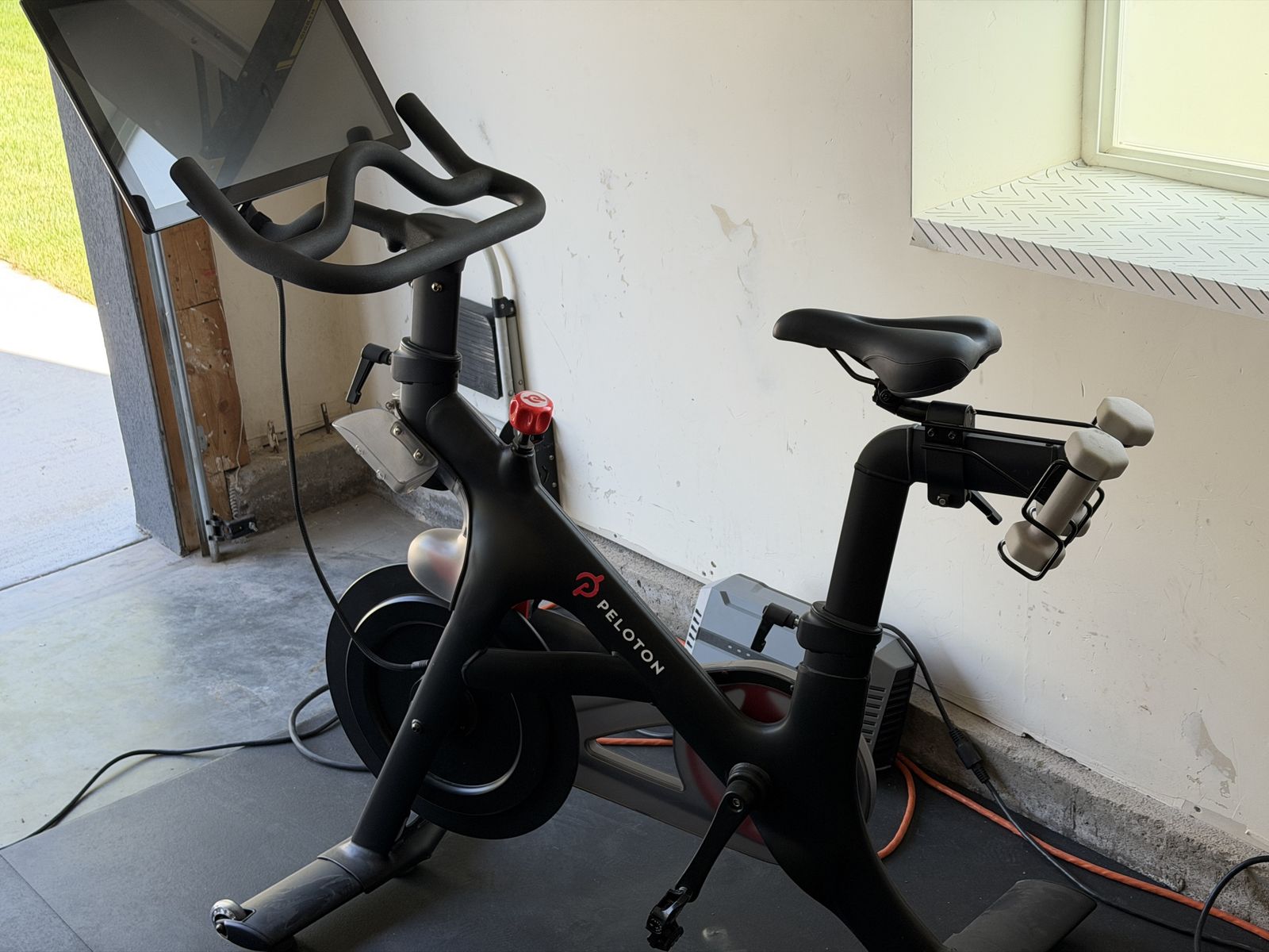 Peloton Bike and Dumbbells