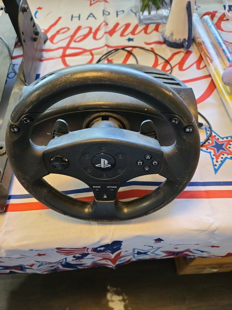 Thrustmaster T300 or similar